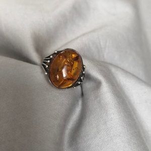 Amber and silver ring.